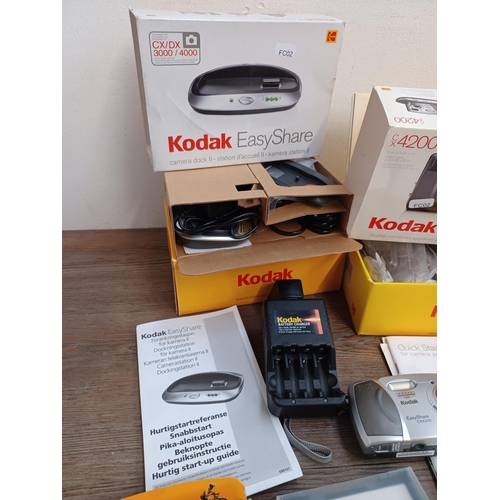 451 - A collection of Kodak items to include boxed EasyShare Camera Dock II and CX4200 digital camera, cas... 