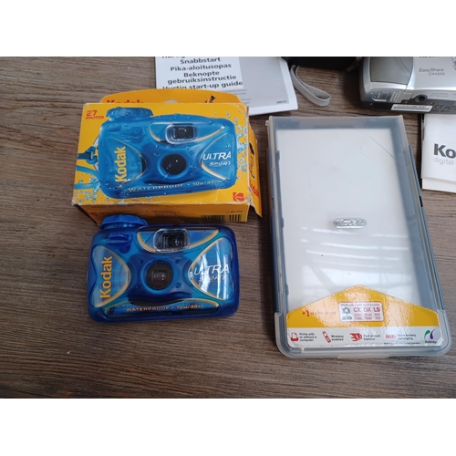 451 - A collection of Kodak items to include boxed EasyShare Camera Dock II and CX4200 digital camera, cas... 