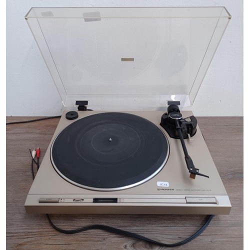 471A - A Pioneer PL-4 direct drive two speed turntable with polymer graphite low-mass high tracking ability... 