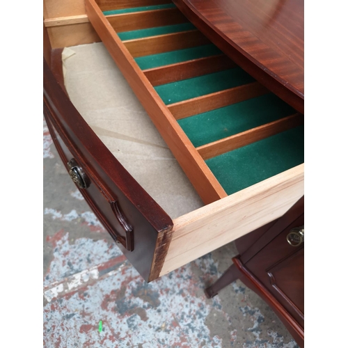 387 - A Regency style mahogany sideboard with one central drawer and two outer cupboard doors - approx. 91... 