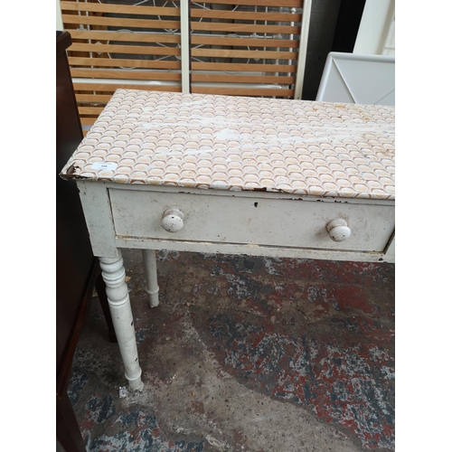 388 - A Victorian white painted pine two drawer console table - approx. 77cm high x 107cm wide x 39cm deep