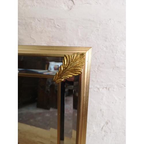 409 - A 19th century style gilt and bevelled glass framed wall mirror - approx. 63cm x 63cm