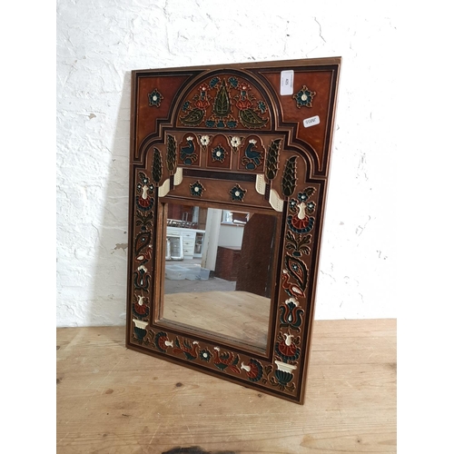 425 - An Indian copper and enamel framed wall mirror - approx. 60cm high x 41cm wide