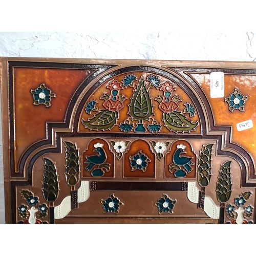 425 - An Indian copper and enamel framed wall mirror - approx. 60cm high x 41cm wide