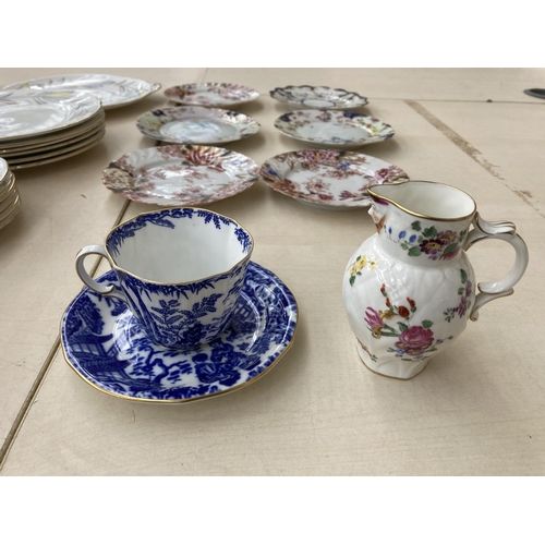 58 - A collection of china to include Royal Worcester hand painted jug, six Oriental hand painted plates,... 