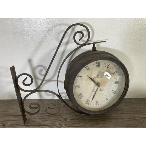 59 - A collection of metalware to include Victorian style Greenhurst wall mountable clock, cast iron and ... 