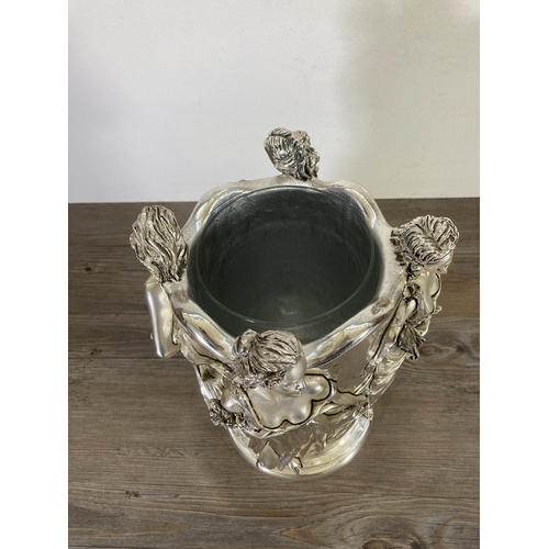 62 - An Italian Marcello Giorgio silver plated and resin Four Seasons bottle holder - approx. 31cm high