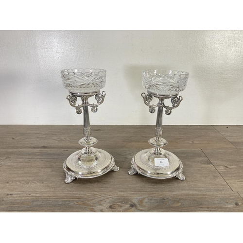 64 - A pair of Victorian Thomas Bradbury & Sons silver plated centrepiece vases with cut glass dishes - a... 