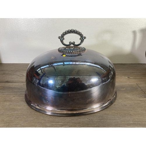 69 - A collection of metalware to include Mappin & Webb Princes plate tureen lid, Victorian silver plated... 