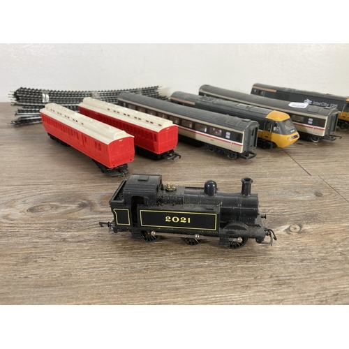 73 - A collection of Hornby 'OO' gauge model railway accessories to include R52 0-6-0 locomotive in black... 