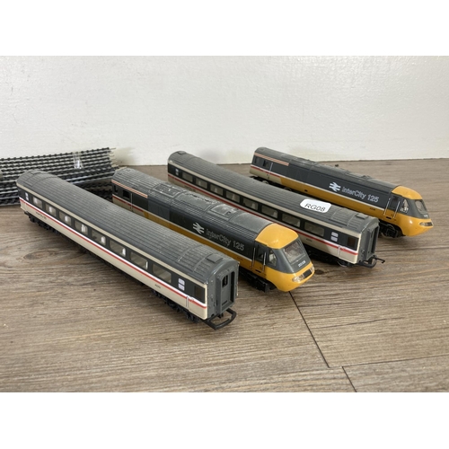 73 - A collection of Hornby 'OO' gauge model railway accessories to include R52 0-6-0 locomotive in black... 