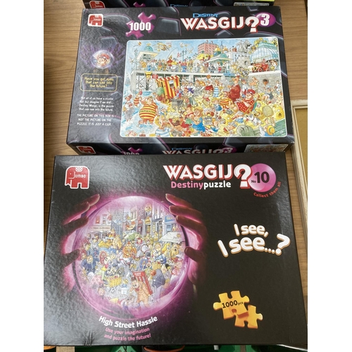 81 - Seven boxed Jumbo Wasgij jigsaw puzzles