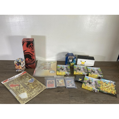 91 - A collection of Pokémon trading cards and accessories