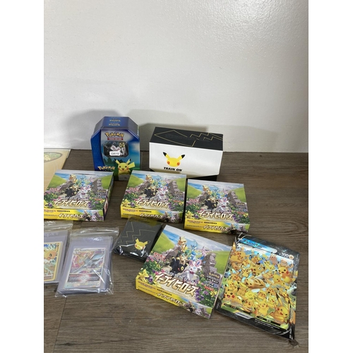 91 - A collection of Pokémon trading cards and accessories