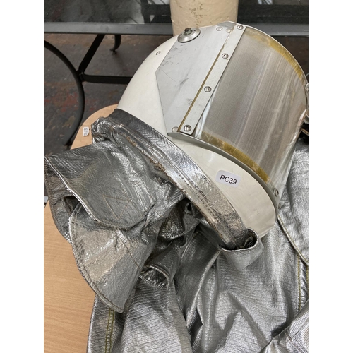 94 - A Morning Pride MFG Co. aluminized PBI/kevlar aramid fabric proximity suit comprising jacket, trouse... 