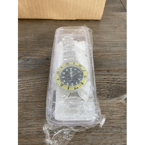 138 - Two boxes containing a large quantity of Lorus quartz wristwatches