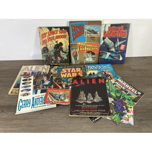 169 - A collection of vintage books and annuals to include Captain Scarlett and Thunderbirds, Fantastic An... 