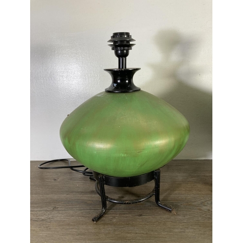 176 - A pair of green ceramic and black metal table lamps - approx. 43cm high