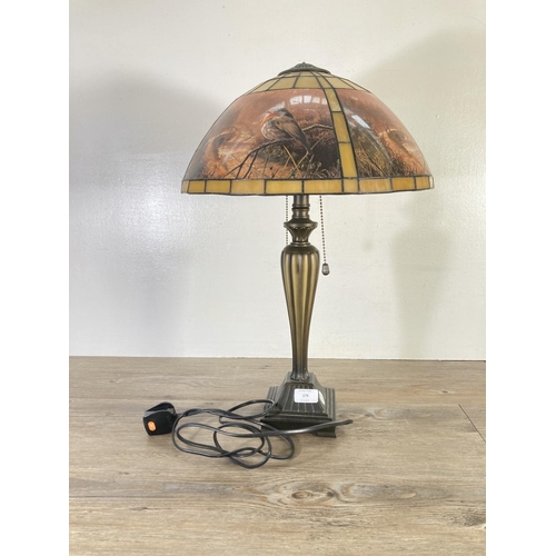 179 - A Thomas Kinkade Tiffany style 'Dawn's Early Light' table lamp - approx. 57cm high