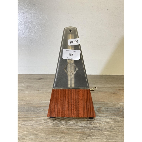 199 - A Wittner mahogany effect metronome - approx. 21cm high