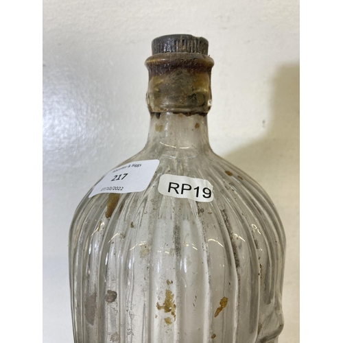 217 - A mid 20th century 'poison - not to be taken' glass bottle - approx. 36cm high