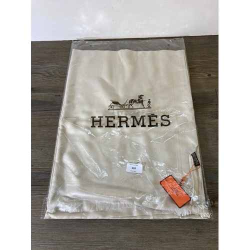 220 - A cashmere and silk scarf believed to by Hermés