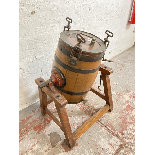 236 - A 19th century Waide & Sons Ltd no. 1 Victoria oak butter churn - approx. 72cm high