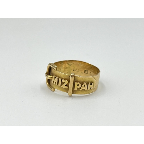 1126 - Two gold rings, one Mizpah - approx. gross weight 3.38 grams and one 15ct gold garnet trilogy ring -... 