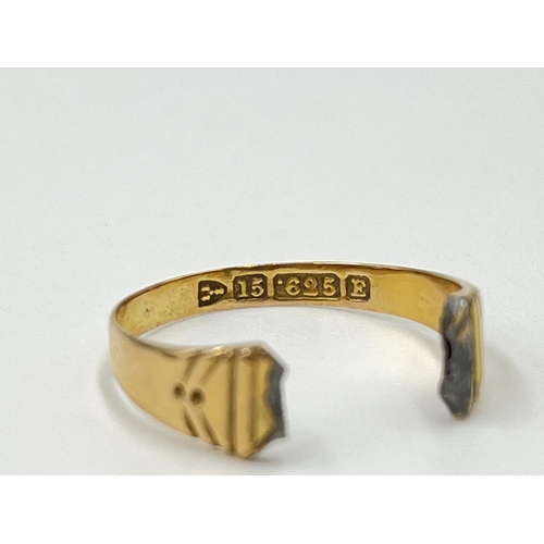 1126 - Two gold rings, one Mizpah - approx. gross weight 3.38 grams and one 15ct gold garnet trilogy ring -... 