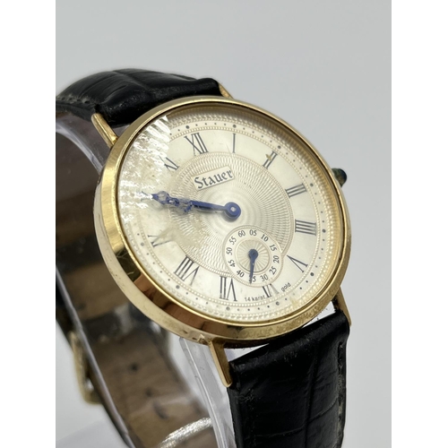 1217 - A Stauer Orosconto style yellow metal cased quartz 35mm men's wristwatch