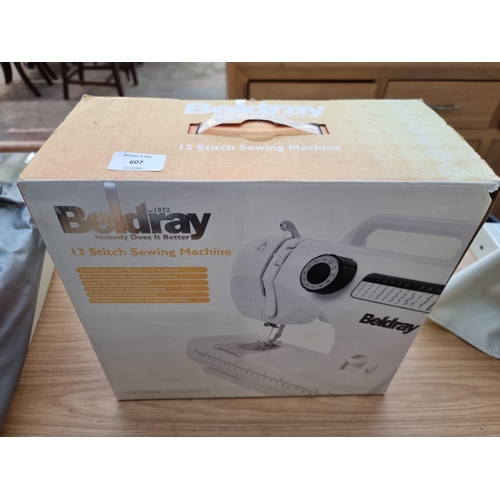 607 - A boxed Beldray twelve stitch sewing machine