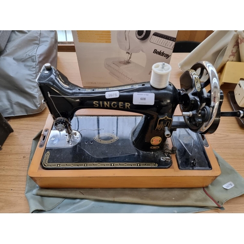 608 - A Singer hand crank sewing machine