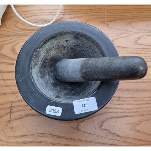 615 - A granite mortar and pestle - approx. 19.5cm diameter