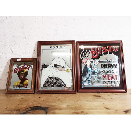 423 - Three framed advertising mirrors