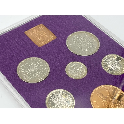 1302 - Three coins set to include cased 2014 First World War Centenary silver coin & medal collection compr... 