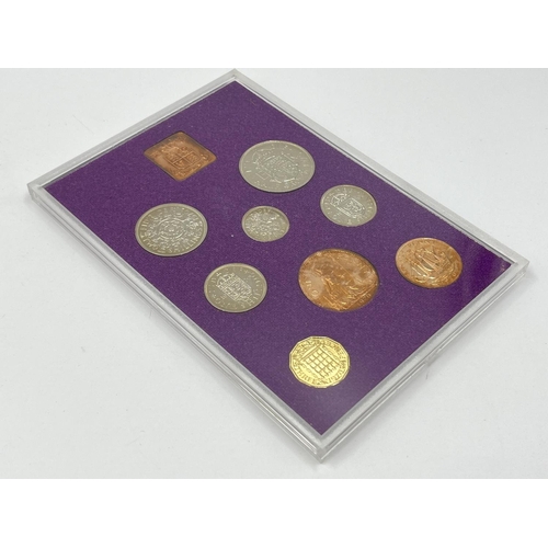 1302 - Three coins set to include cased 2014 First World War Centenary silver coin & medal collection compr... 