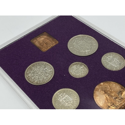 1302 - Three coins set to include cased 2014 First World War Centenary silver coin & medal collection compr... 