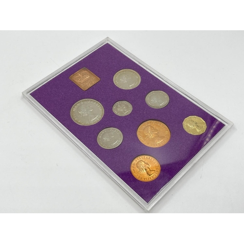 1302 - Three coins set to include cased 2014 First World War Centenary silver coin & medal collection compr... 