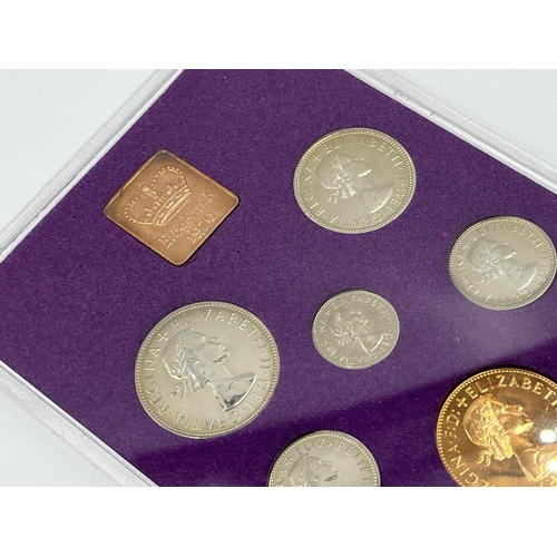 1302 - Three coins set to include cased 2014 First World War Centenary silver coin & medal collection compr... 