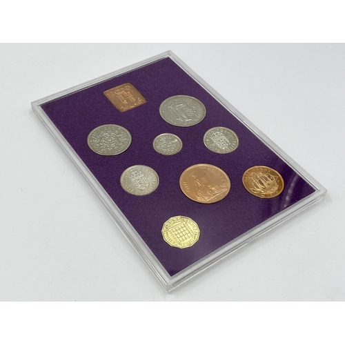 1302 - Three coins set to include cased 2014 First World War Centenary silver coin & medal collection compr... 