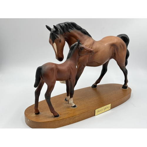 17 - A Beswick Spirit of Affection figurine on wooden plinth