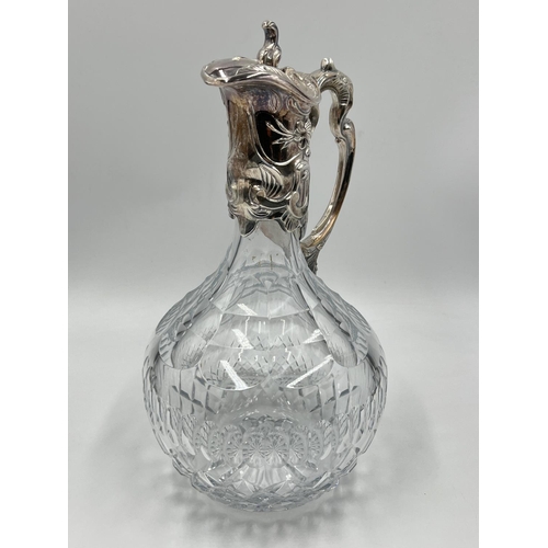 2 - A cut glass and silver plated claret jug - approx. 28cm high