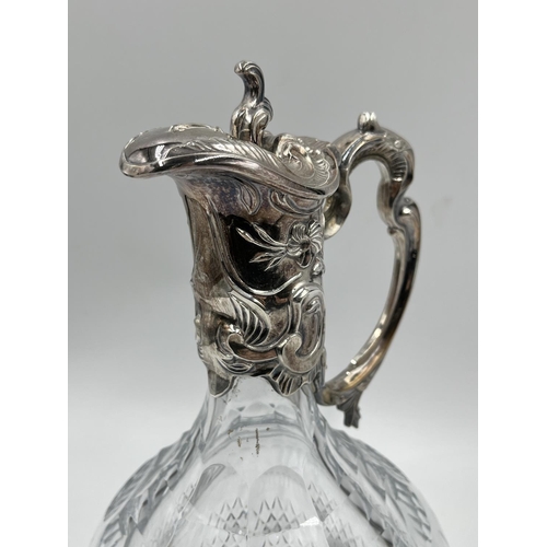 2 - A cut glass and silver plated claret jug - approx. 28cm high