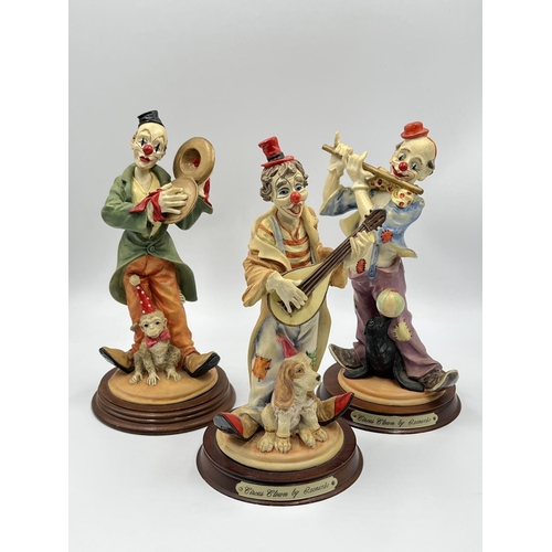 23 - Three Leonardo Collection Circus Clown figurines - largest approx. 26cm high