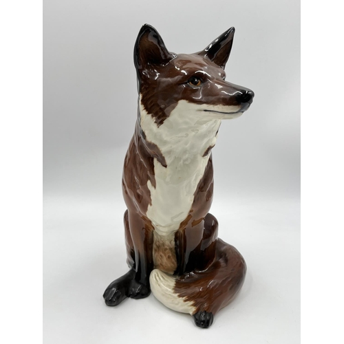 9 - A Beswick Fireside Fox figurine, model no. 2348 - approx. 31cm high