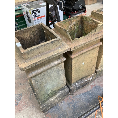 712 - Two Victorian cast stone chimney pots - approx. 67cm high x 33cm wide x 31cm deep