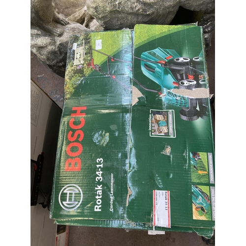 717 - A boxed Bosch 240 lawn mower