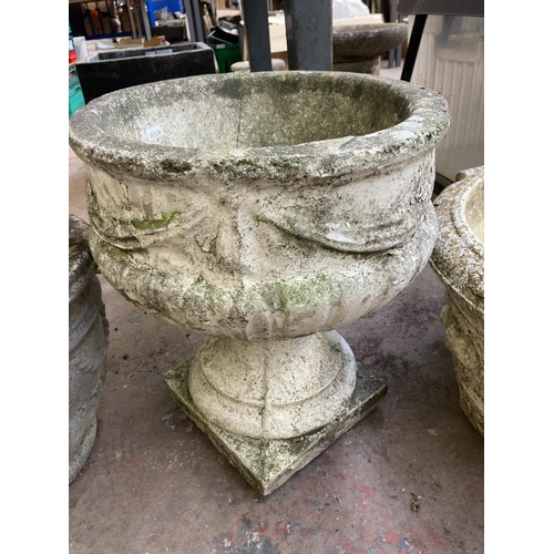 721 - Two cast stone garden planters - tallest approx. 43cm high