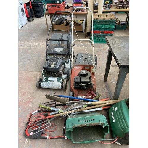 723 - A large collection of assorted gardening equipment and tools to include Hayter Harrier 48 petrol law... 