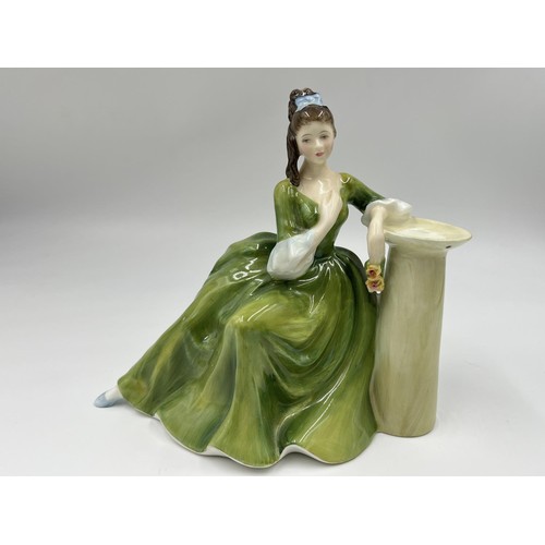 15 - Four ceramic lady figurines, three Royal Doulton and one Made in England